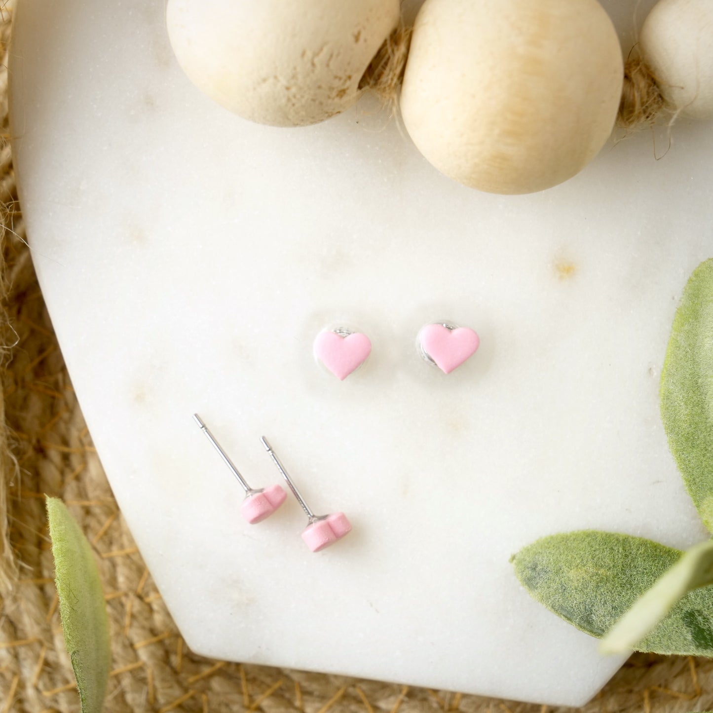Micro Heart Studs in Pink