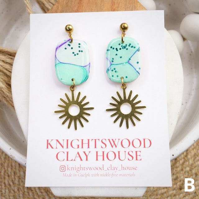 Duke Dangles in Mermaid Bubbles with Brass