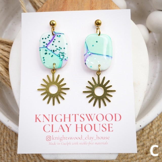 Duke Dangles in Mermaid Bubbles with Brass