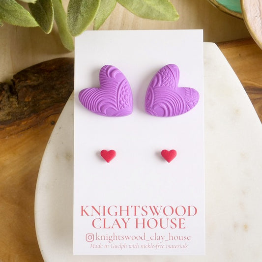 Stud 2 Pack with Puffy Purple Fan Heart Studs and Red Micro Heart Studs