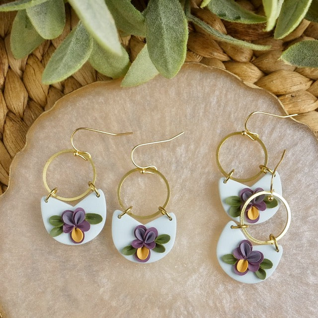 Kipling Dangles in Violet Flowers