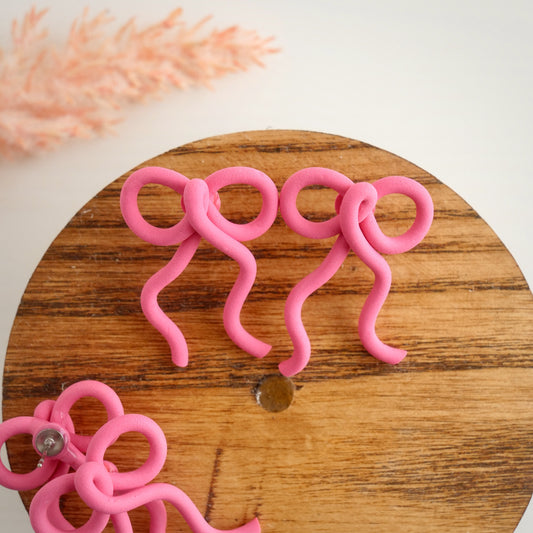 Skinny Loop Bow Studs in Raspberry Pink