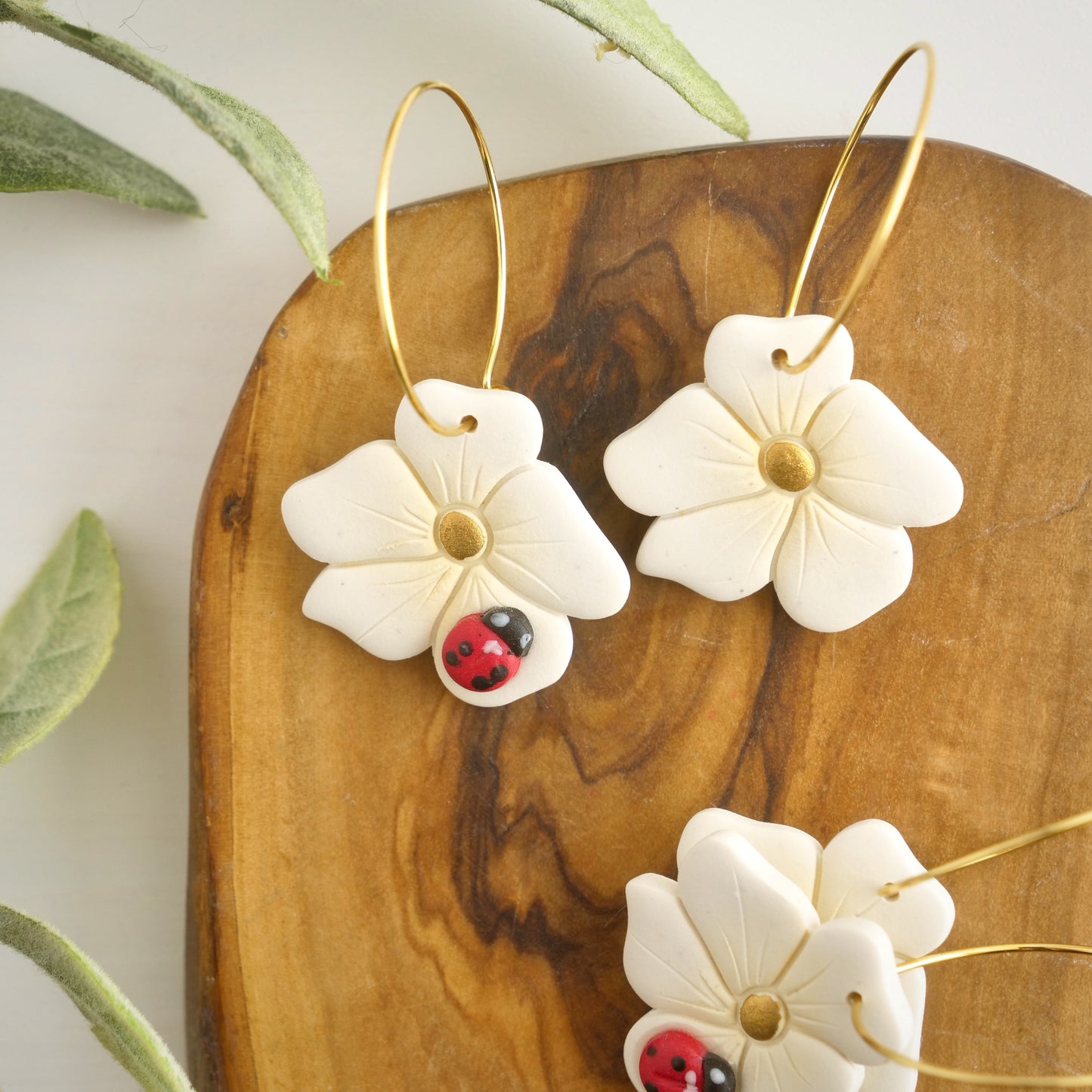 White Flower Hoop with Ladybug