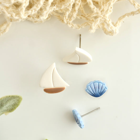 Stud 2 Pack with Sailboat and Blue Clamshell Studs
