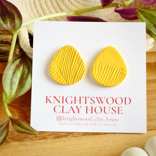 Elora Statement Studs in Yellow