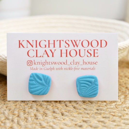 Quad Studs in Electric Blue