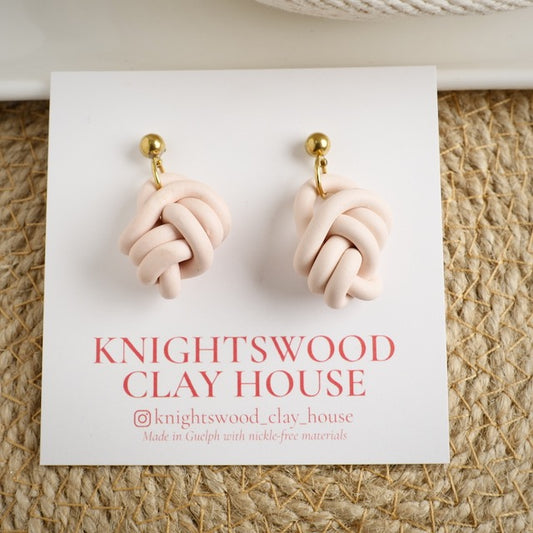 Knot Dangles in Light Coral